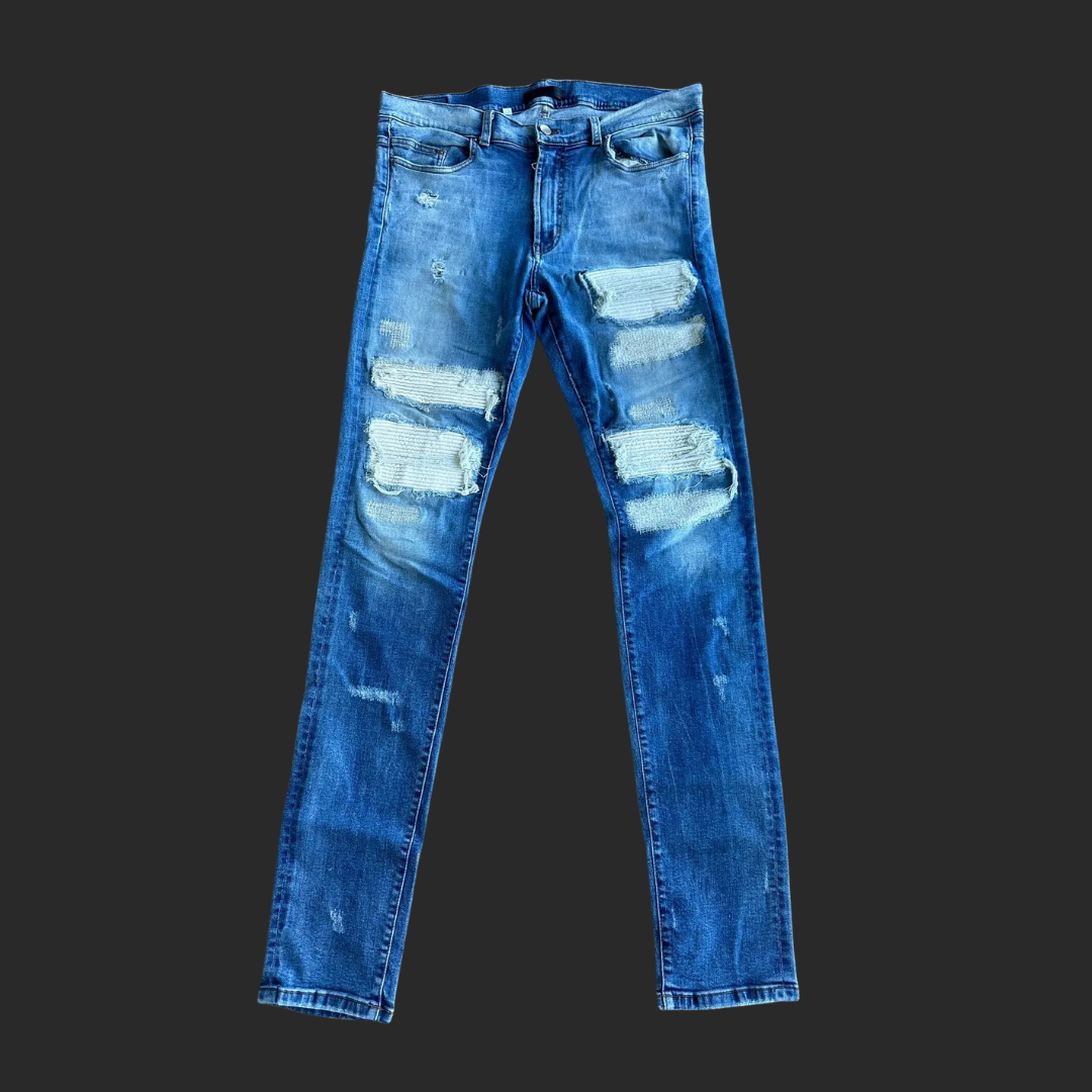 Amiri Distressed Denim (Medium Wash/White Patches)