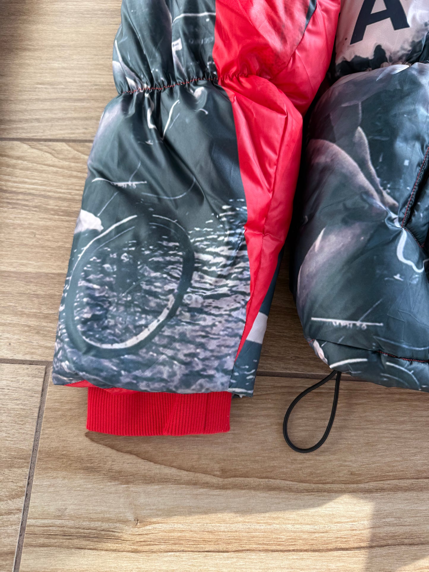 KidSuper Studios “Genius Collage” Puffer Jacket