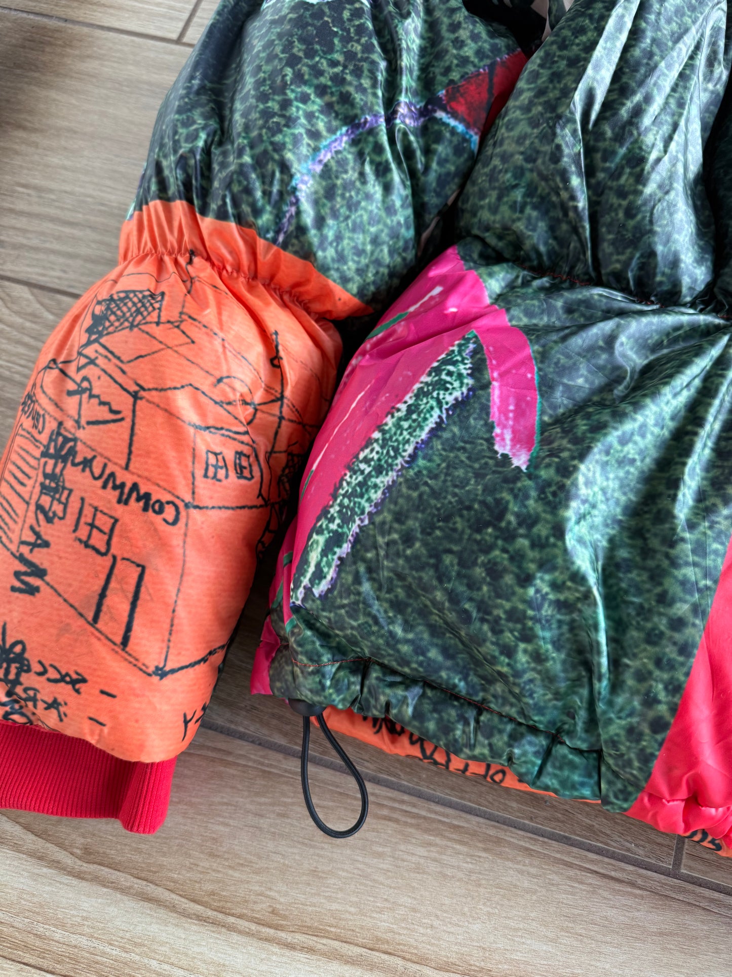 KidSuper Studios “Genius Collage” Puffer Jacket